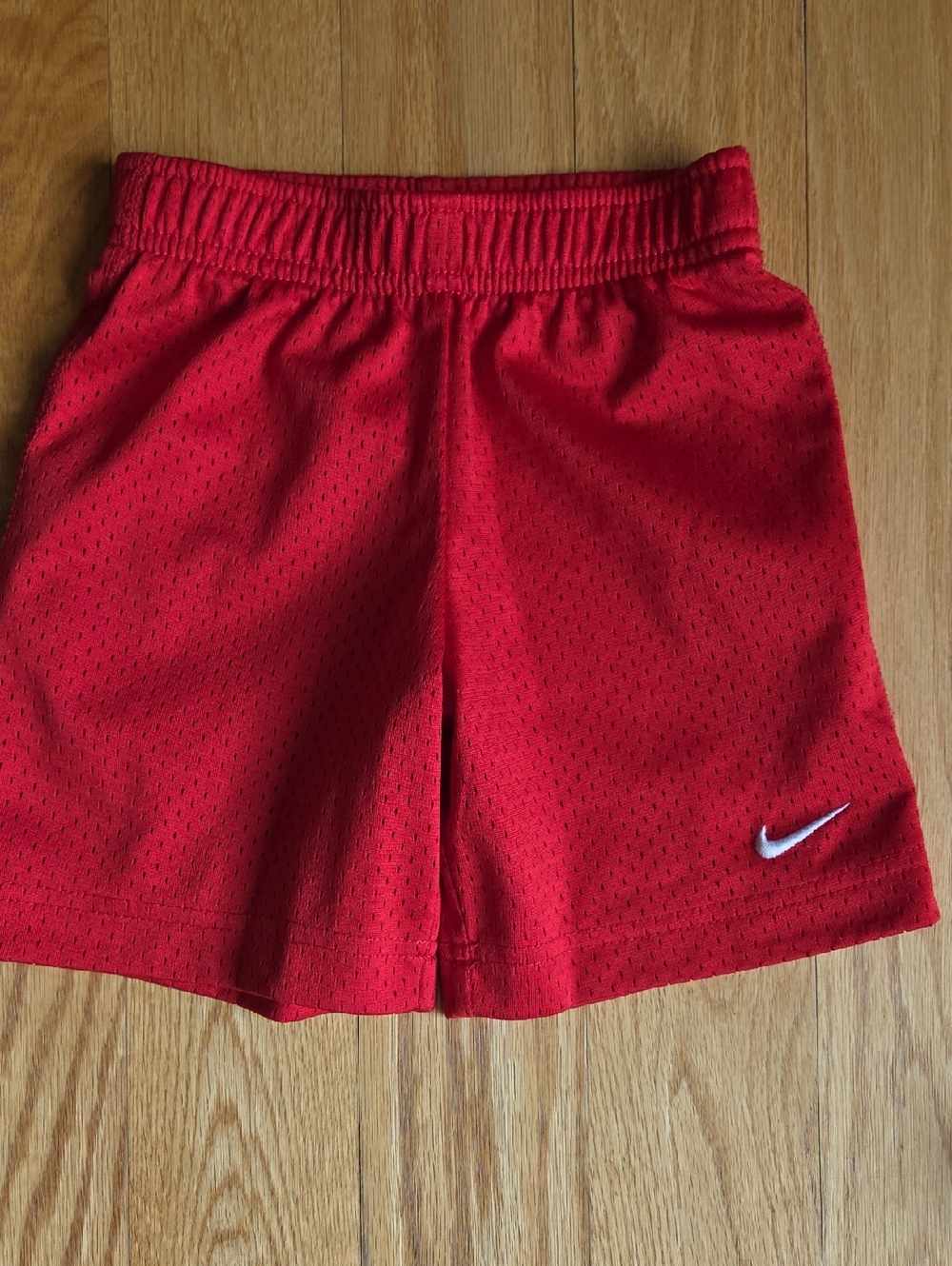 Nike Bright Red Athletic Shorts with White Swoosh